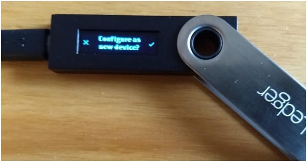 Tekan tombol kanan untuk mengonfirmasi bahwa Anda ingin 'mengkonfigurasi sebagai perangkat baru.'